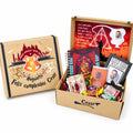 Pack de regalo en caja de cartón con tazas, dulces, portaretratos, blocks y chocolates. Regalo personalizado de temática Hogwatrts de harry potter